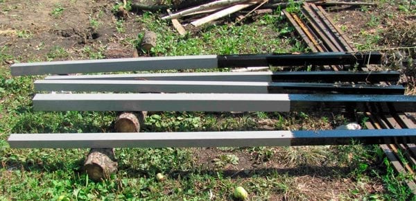 Processing of fence posts with bitumen