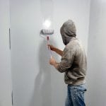 Application of alkyd primer on the wall