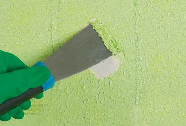 Removing paint from a concrete wall