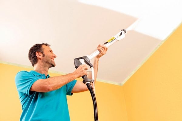 Painting the ceiling with a spray gun