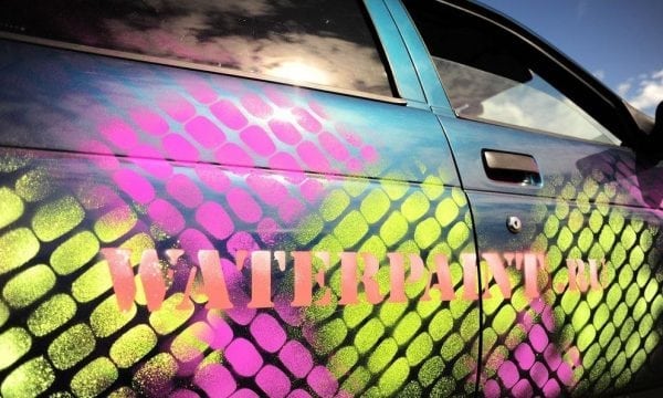 Chalk spray paint on a car surface