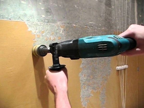 Removing old paint with a puncher
