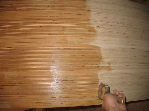 Impregnation of sheets of plywood with linseed oil