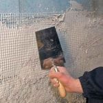 Plaster reinforcement with metal mesh