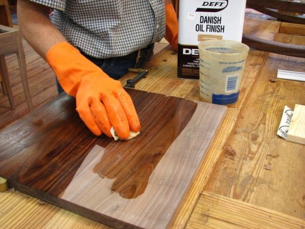 Impregnation of wood products with tung oil