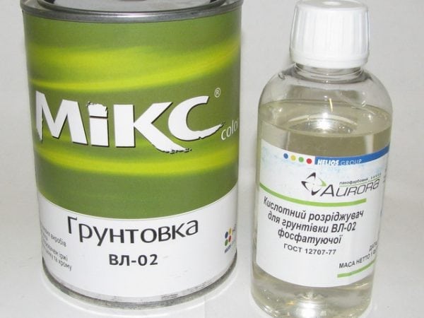 Primer bicomponente con diluente acido