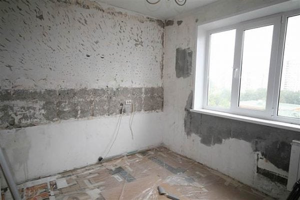 Wall preparation in an apartment for installation of insulation