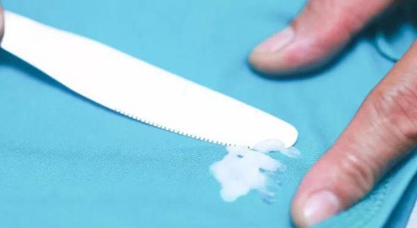 Removing silicone sealant from clothing