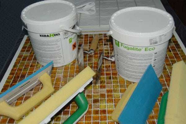 Tools and materials for working with epoxy grout