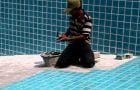 Tile adhesive for pools