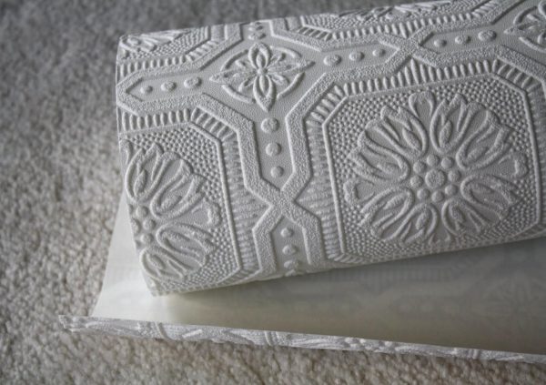 The relief pattern on a roll of wallpaper