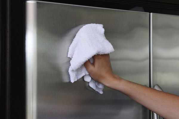 Cleaning the refrigerator from adhesive tape