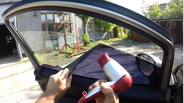Removing tint with a hairdryer