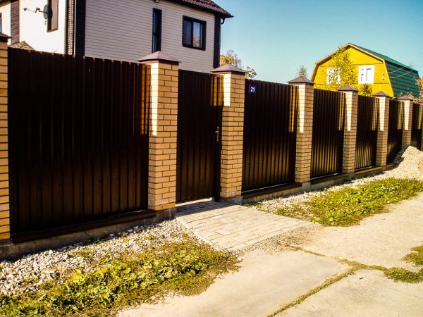 A brown fence is recommended on the east side.