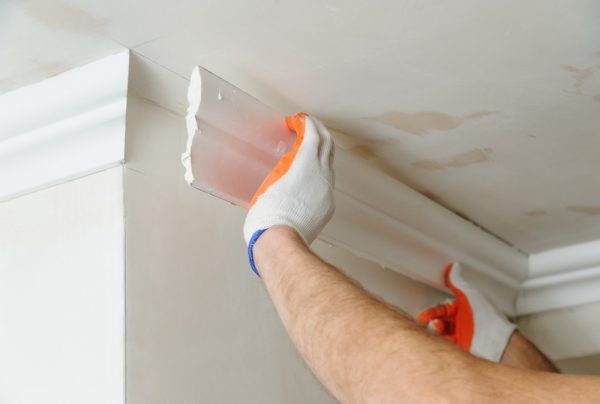 Installation of ceiling skirting boards