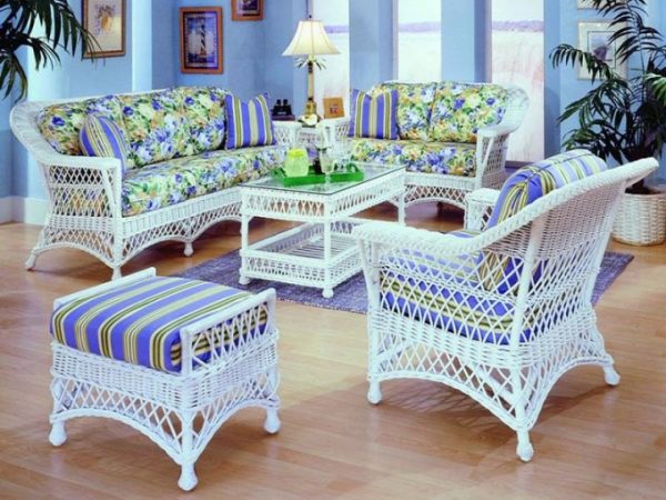 Wicker furniture in a blue interior