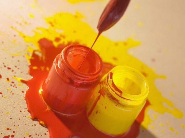 Mix of red and yellow paint