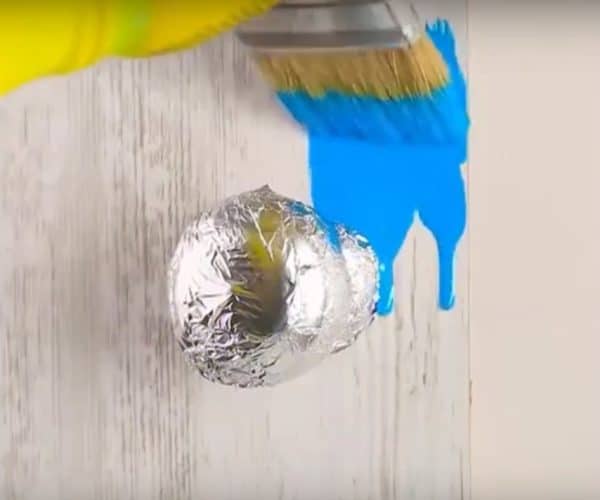 Proteção da maçaneta da porta durante a pintura