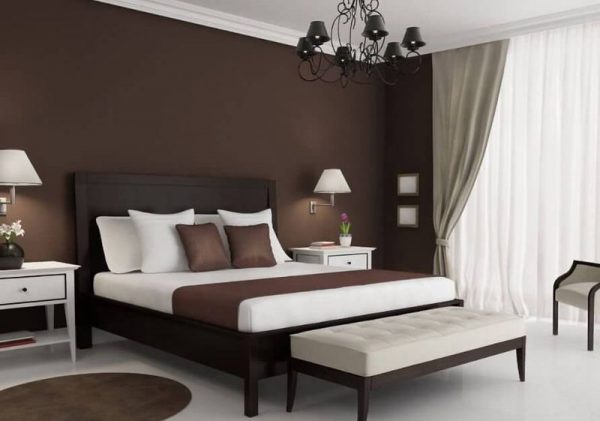 Designul unui dormitor realizat în nuanțe de maro închis
