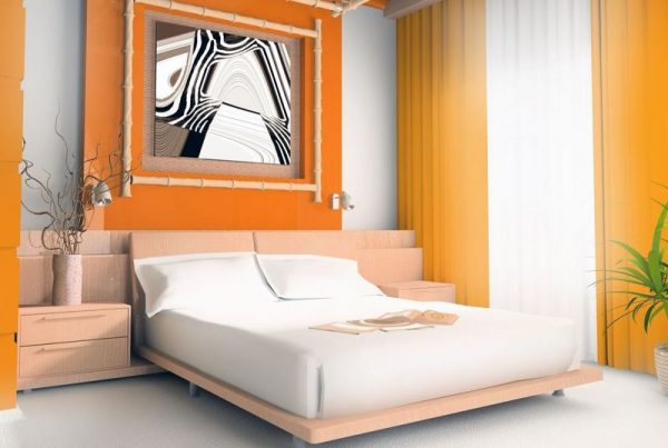 Diseño de un dormitorio realizado en colores naranja.