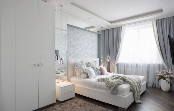 The interior of the bedroom in silver light colors