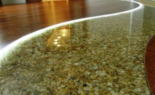 Decorated floor with pebbles and epoxy.