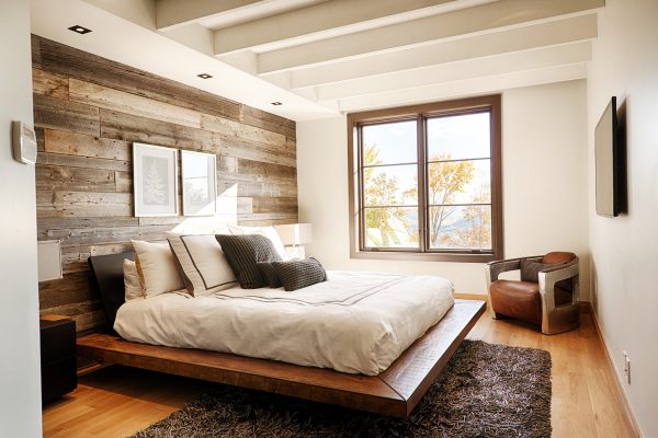 Wall made of natural wood in the bedroom
