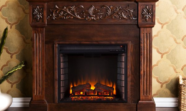 A decorative portal for a fireplace made of solid wood