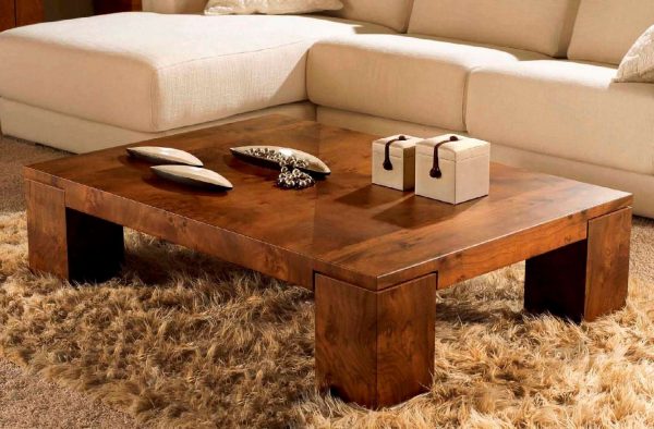 A low coffee table is good for a small room.