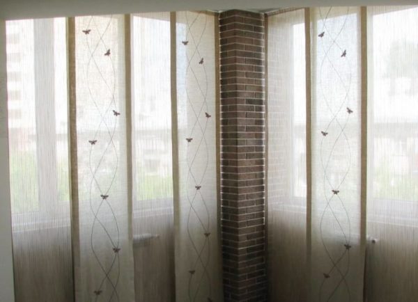 Japanese curtains in the interior of the loggia and balcony