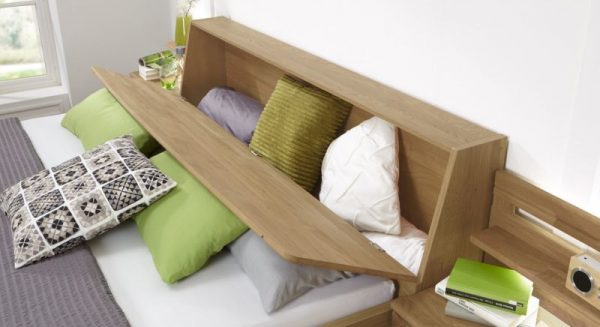Bed with pillow box at headboard