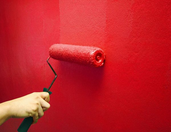 The process of painting the walls with velvet paint